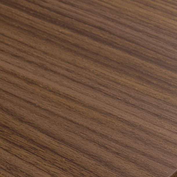 A close-up of a walnut surface.