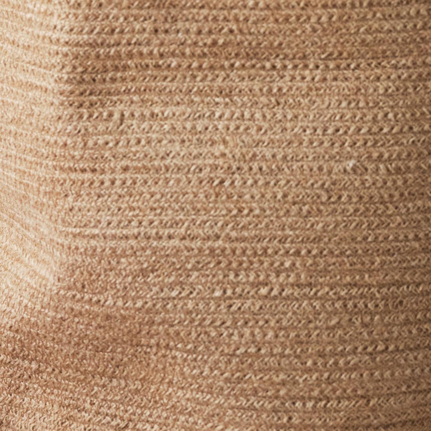 Close up of a woven rug.