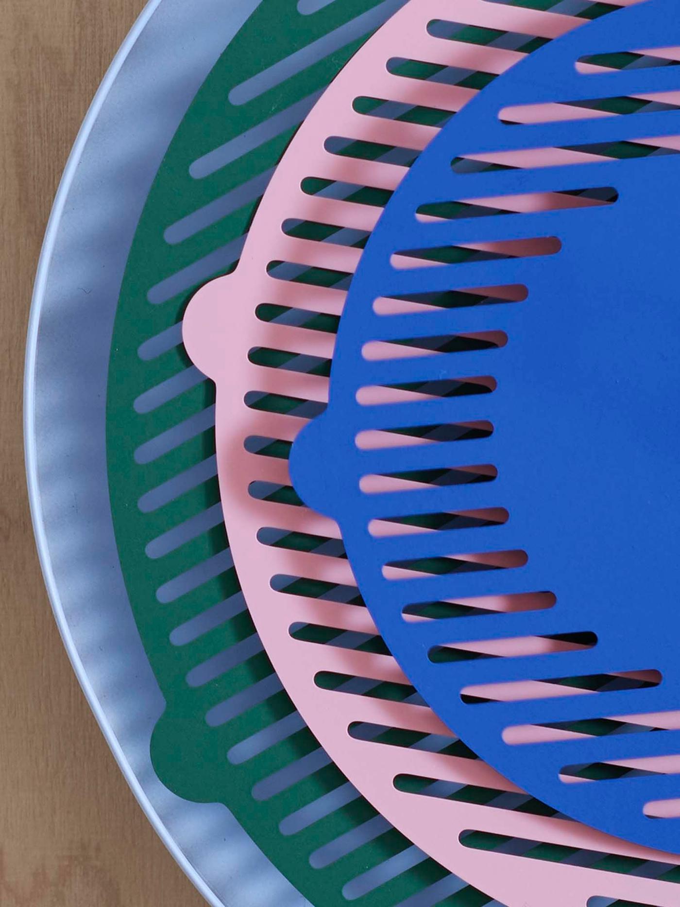 A closeup of a TESAMMANS wall clock.