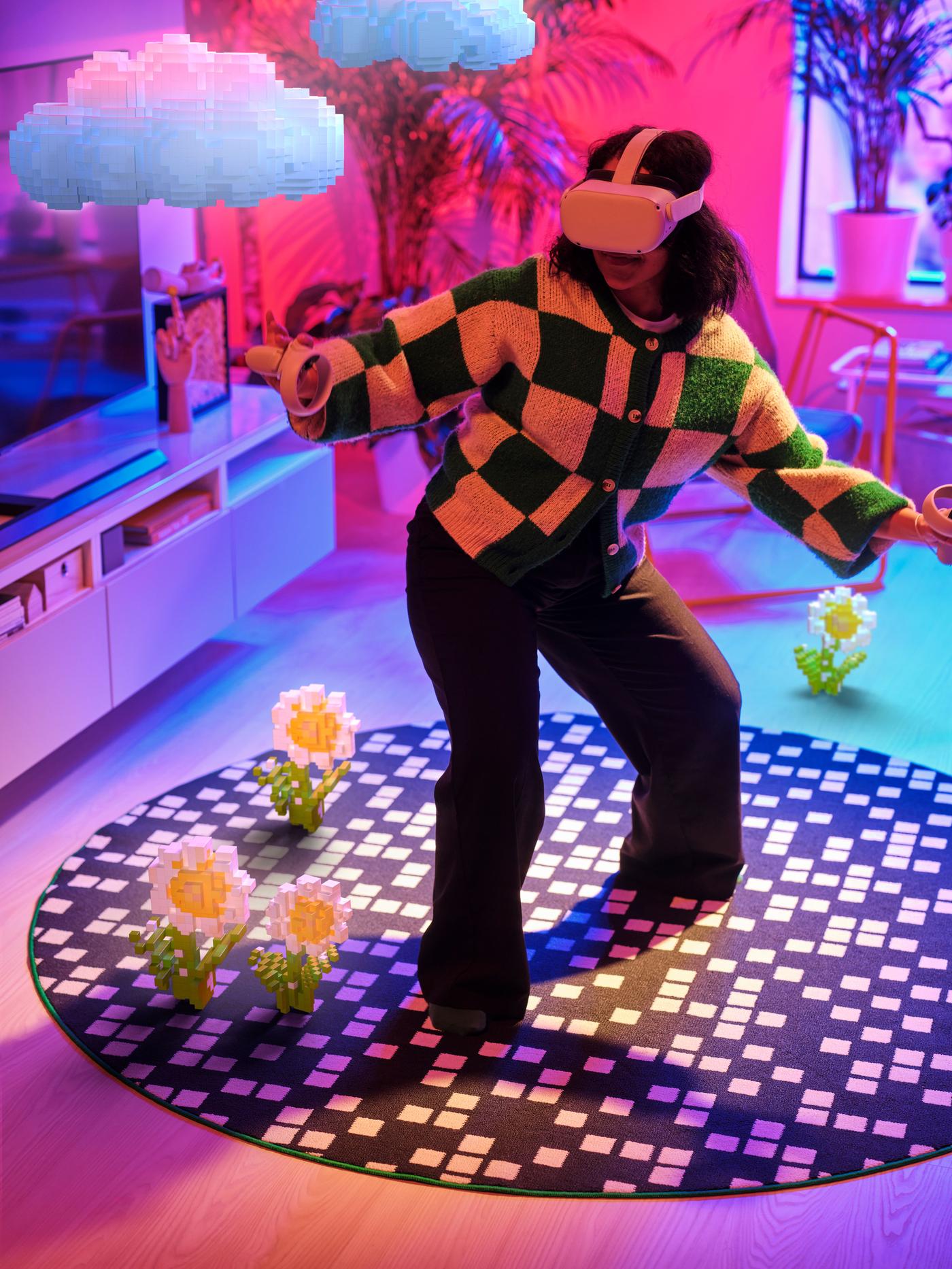 A girl is standing in a dark room on a black and white carpet with a VR headset, immersed in the game