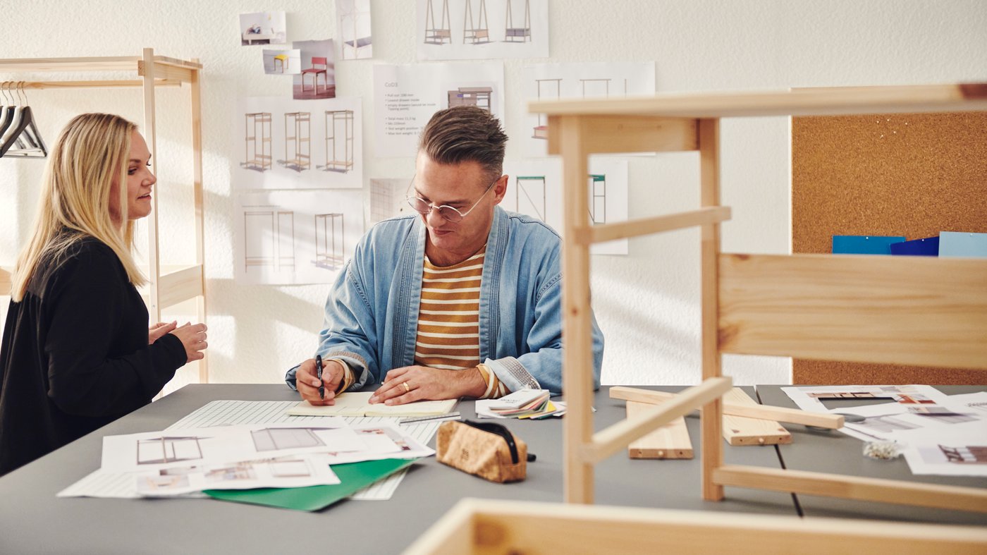 Two IKEA product developers in the creative workshop.