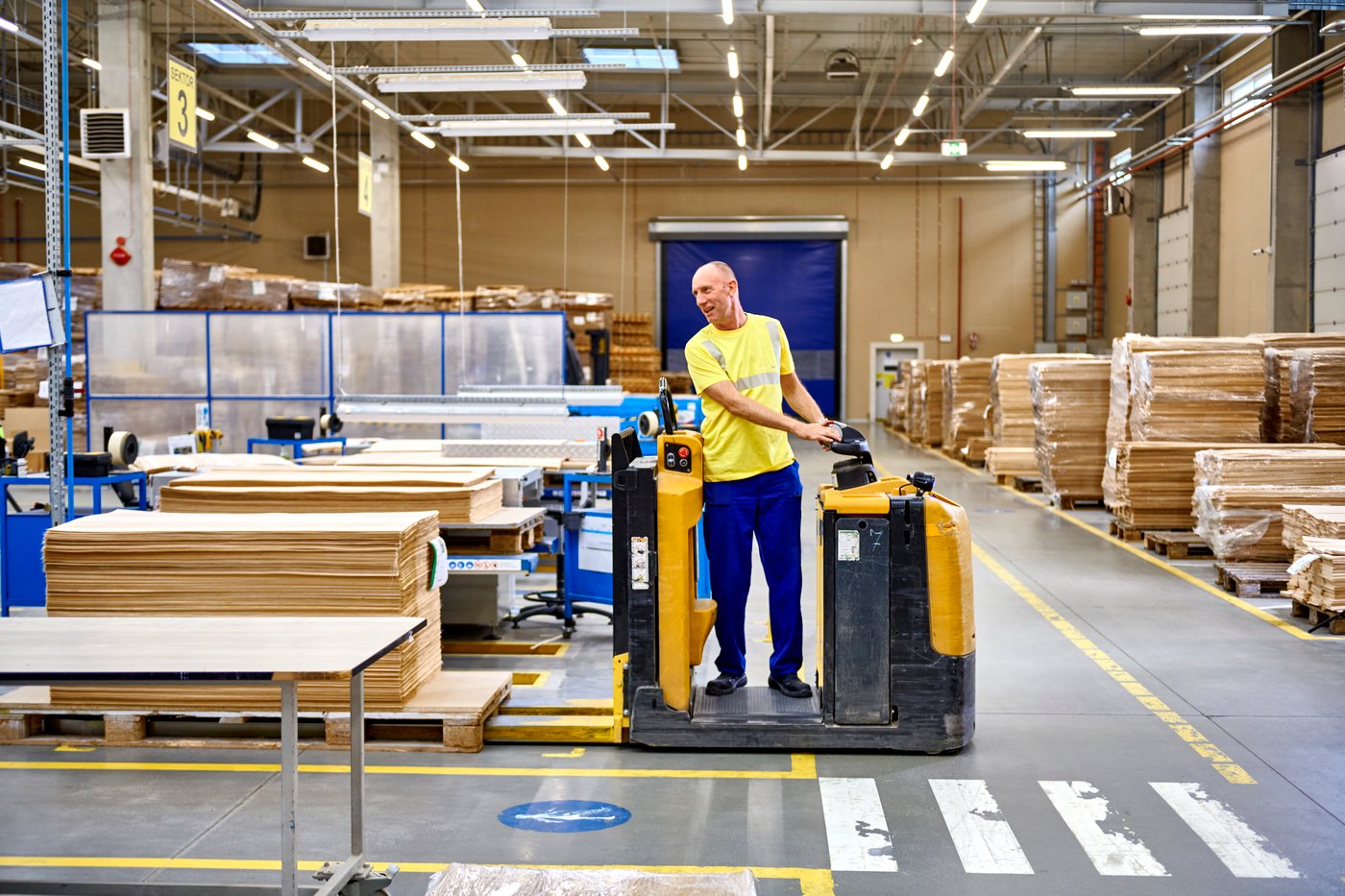 A person operates machinery onsite in Lubawa.