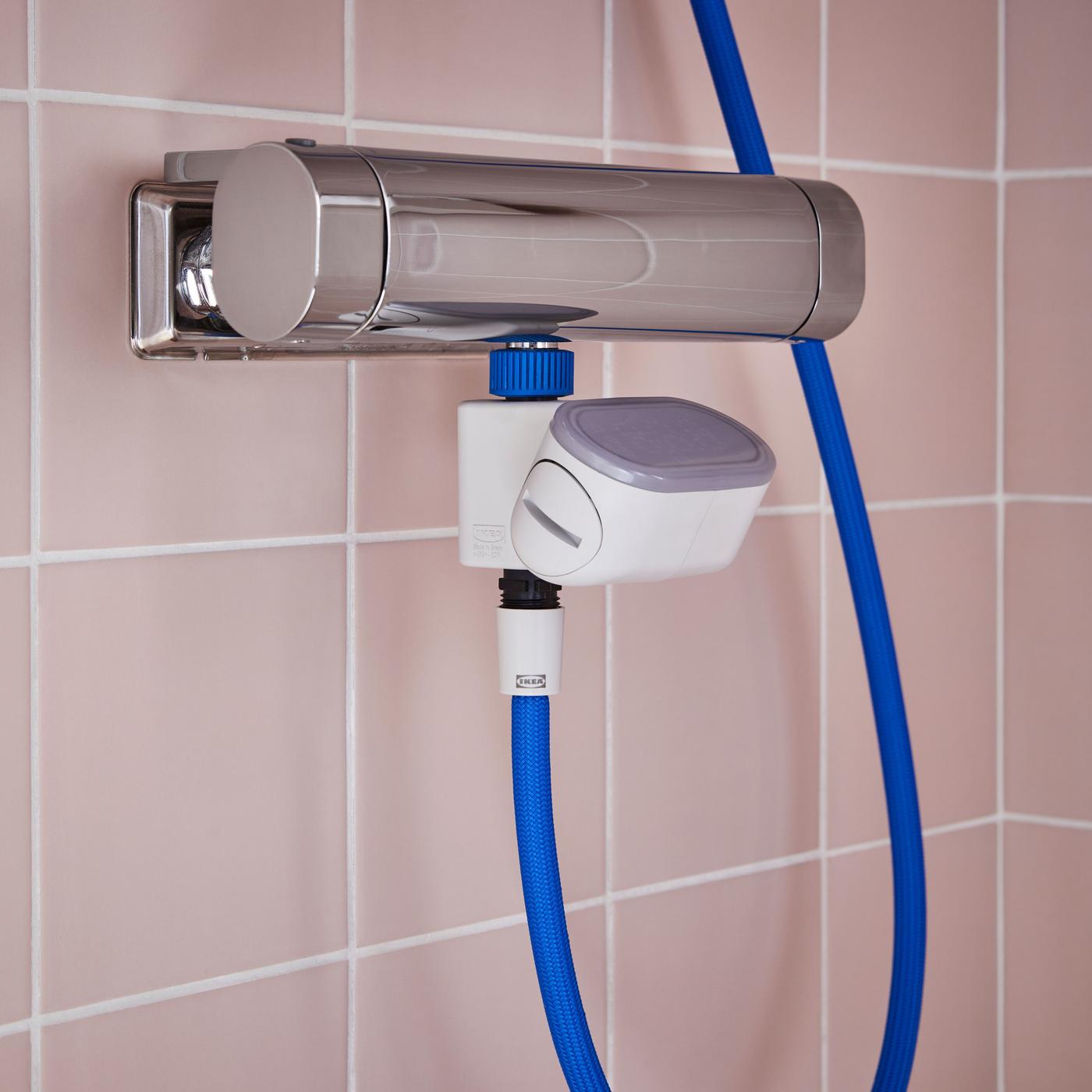 The BERGVATTNET digital meter attached to a shower.