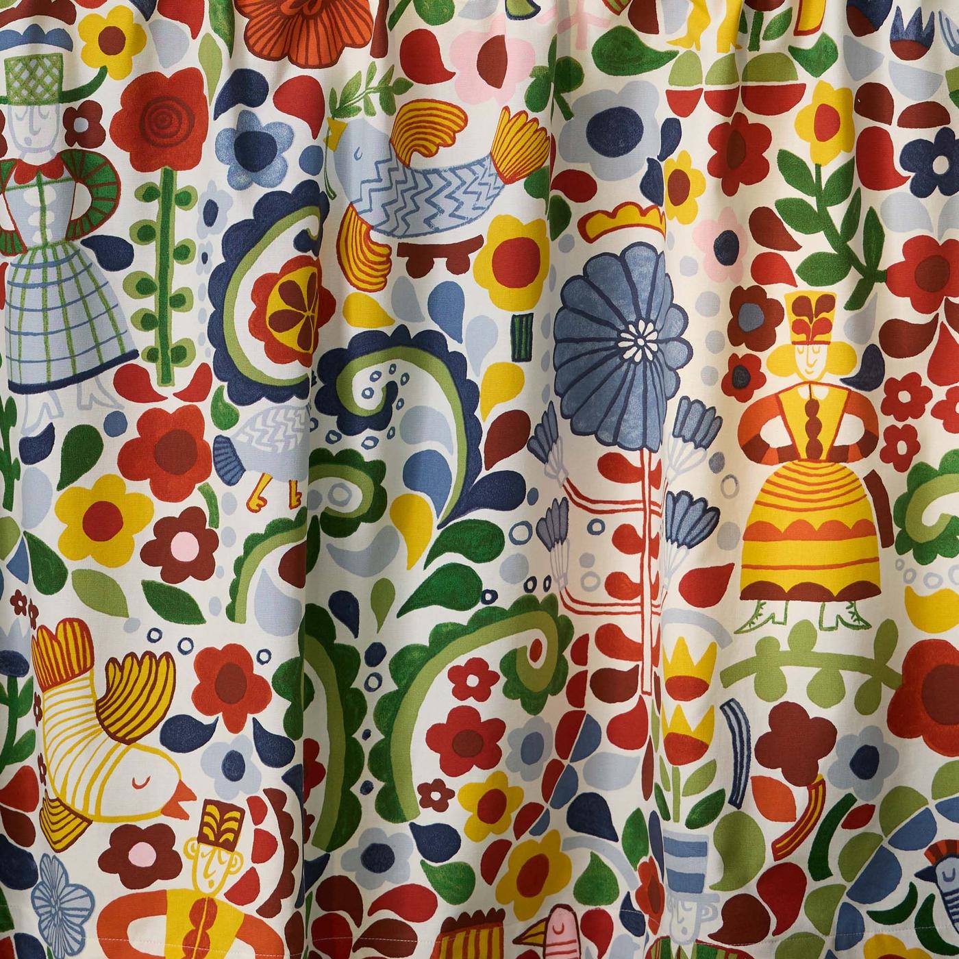 A close-up of colourful, patterned metre fabric.