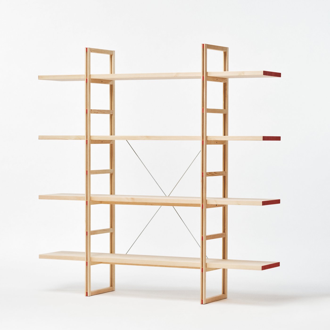 A wooden shelving unit against a white backdrop.
