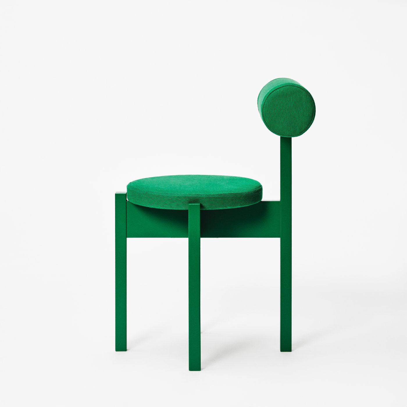 A green chair against a white background.