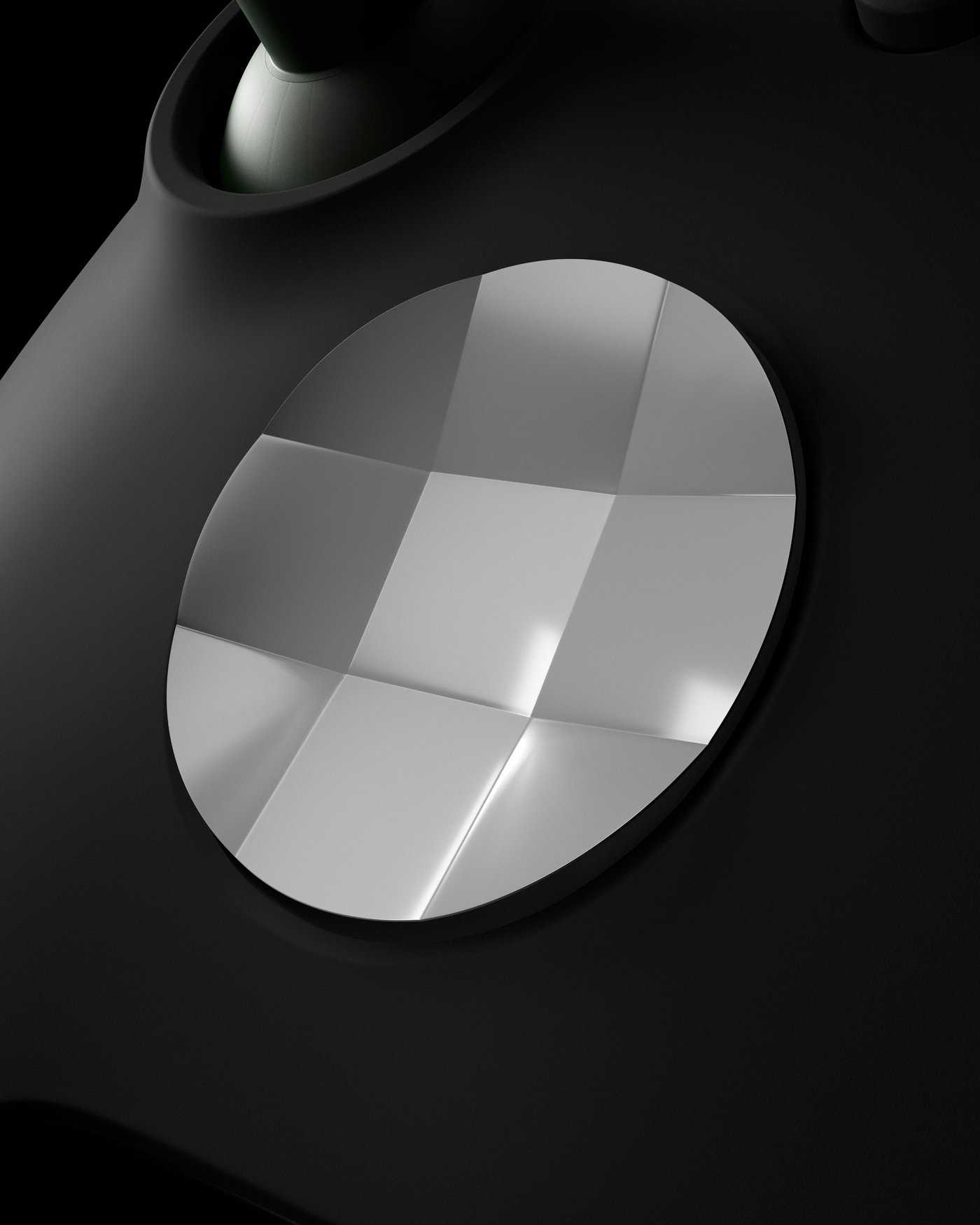 A round stainless steel platter featuring a geometric surface inspired by an Xbox controller D-pad.