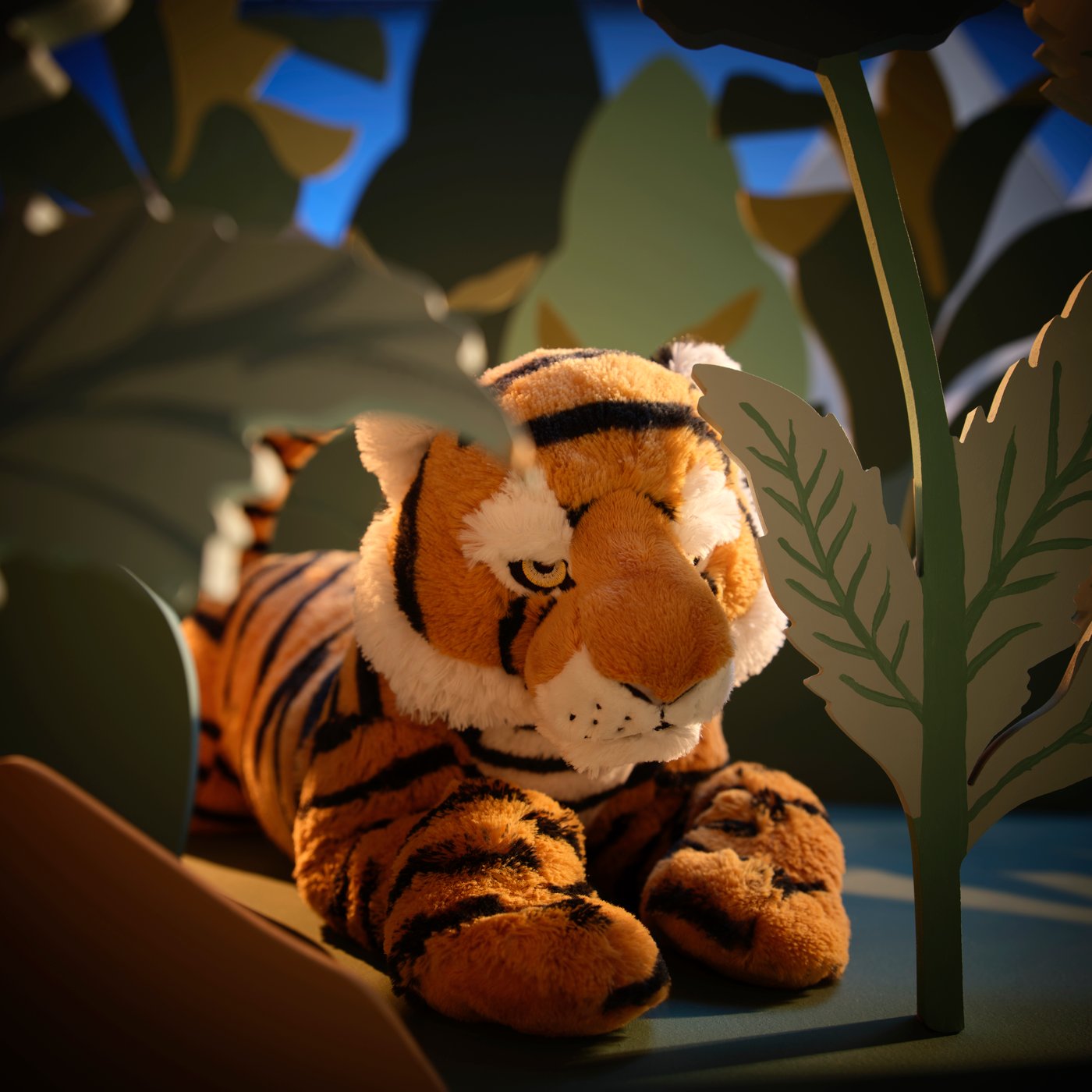 A Bengal tiger in a Himalayan forest setting made from cardboard cut-outs.