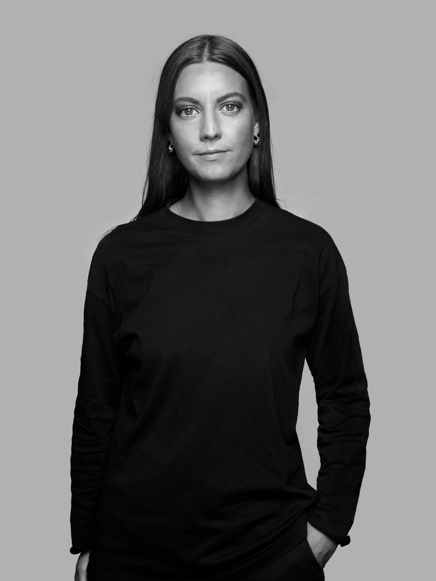 Black and white designer portrait of Paulin Machado.
