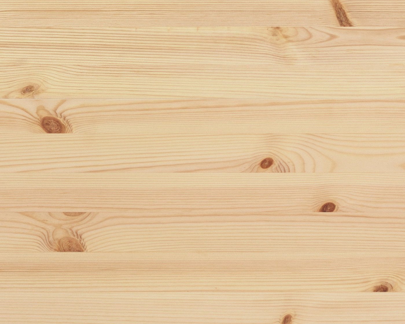 Close up view of a surface made of pine wood.