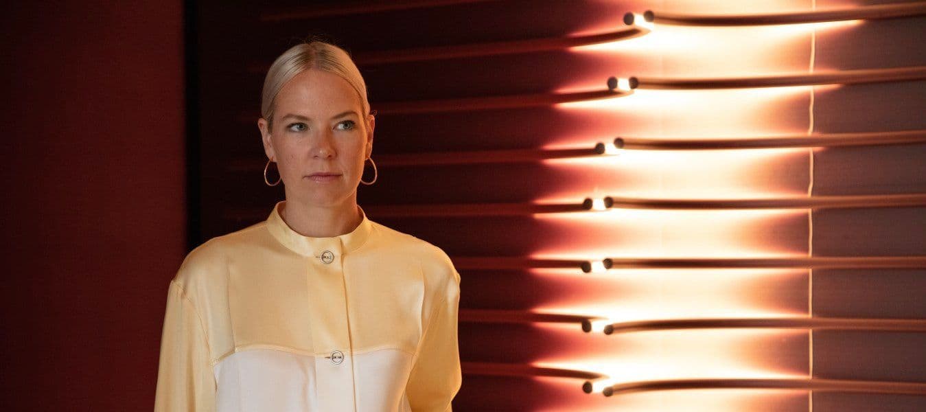 Sabine Marcelis in an abstract, dramatically lit space.