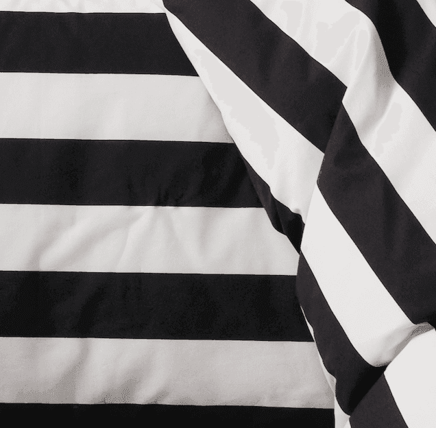 A black and white stripe duvet cover and pillowcase.