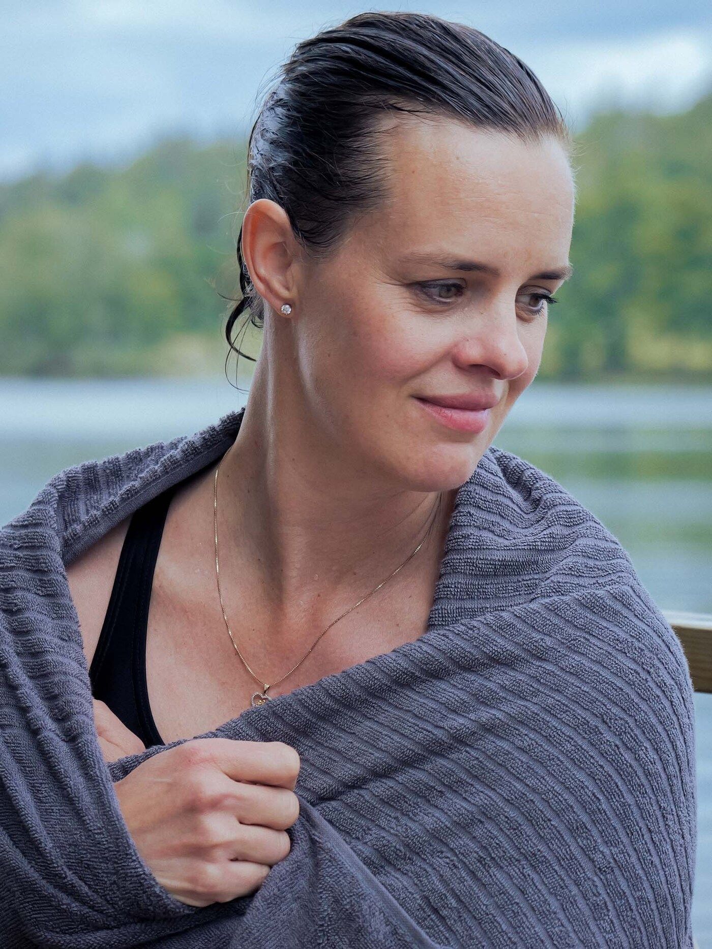 Paulina dries off in a towel.