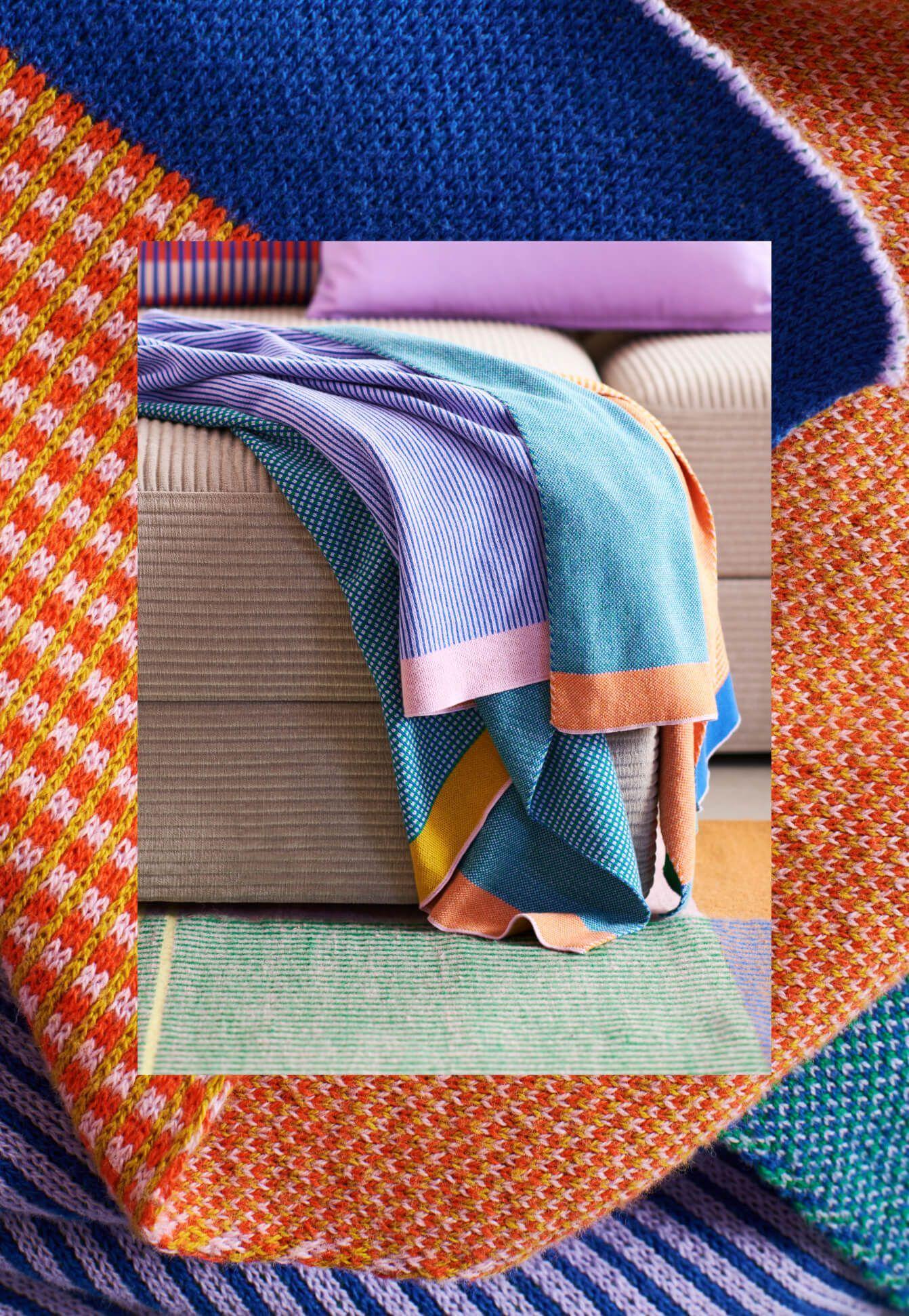 A TESAMMANS throw casually folded on the corner of a sofa.