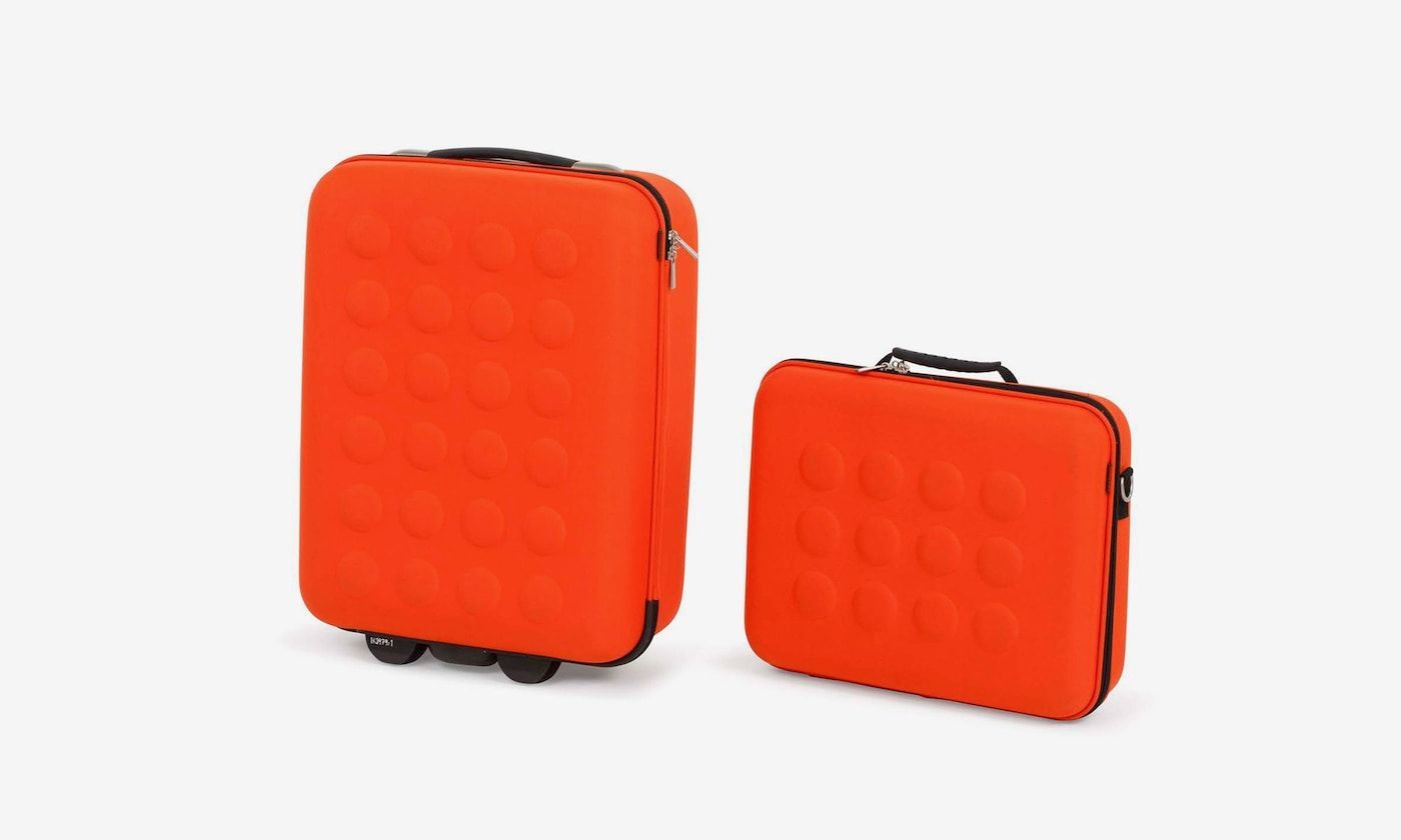 UPPTÄKA suitcase and shoulder bag in orange/red