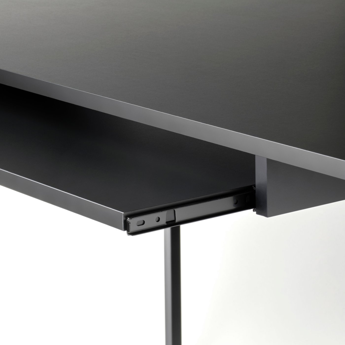 A black desk with a pull-out shelf