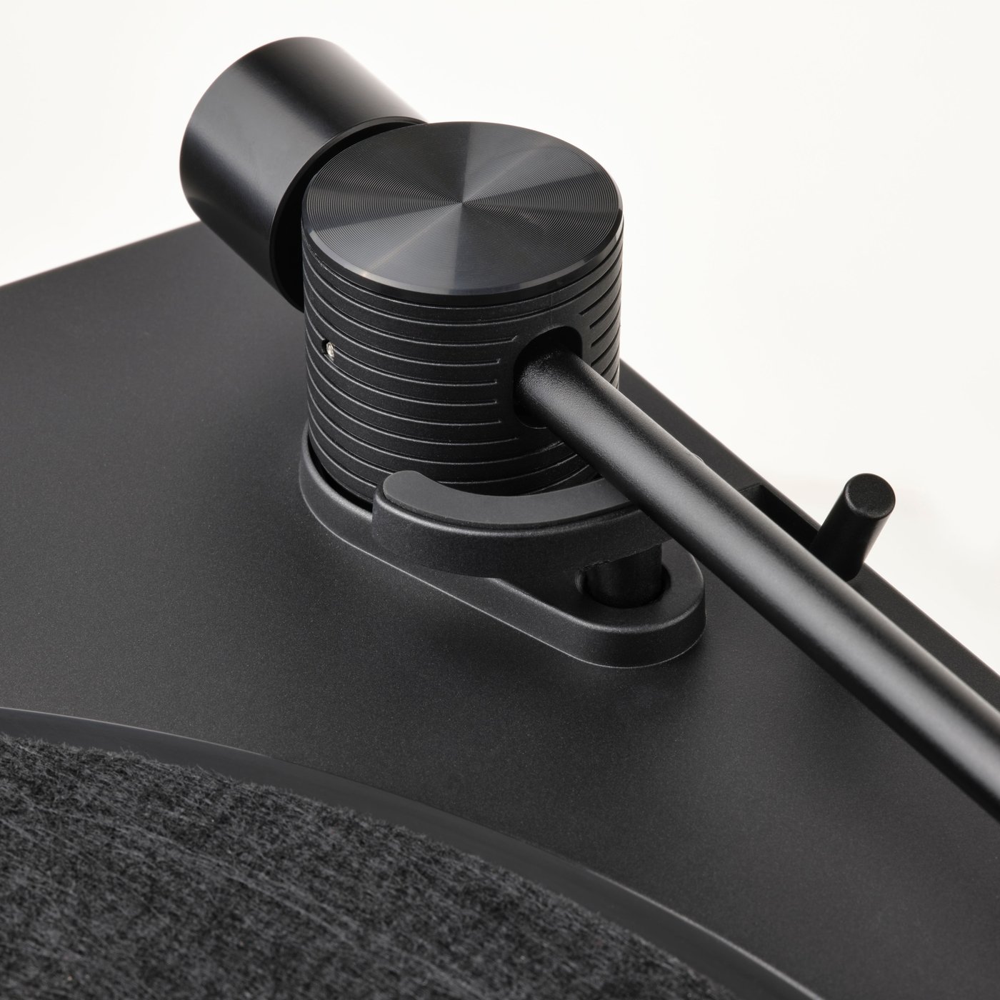 A tonearm on a record player.