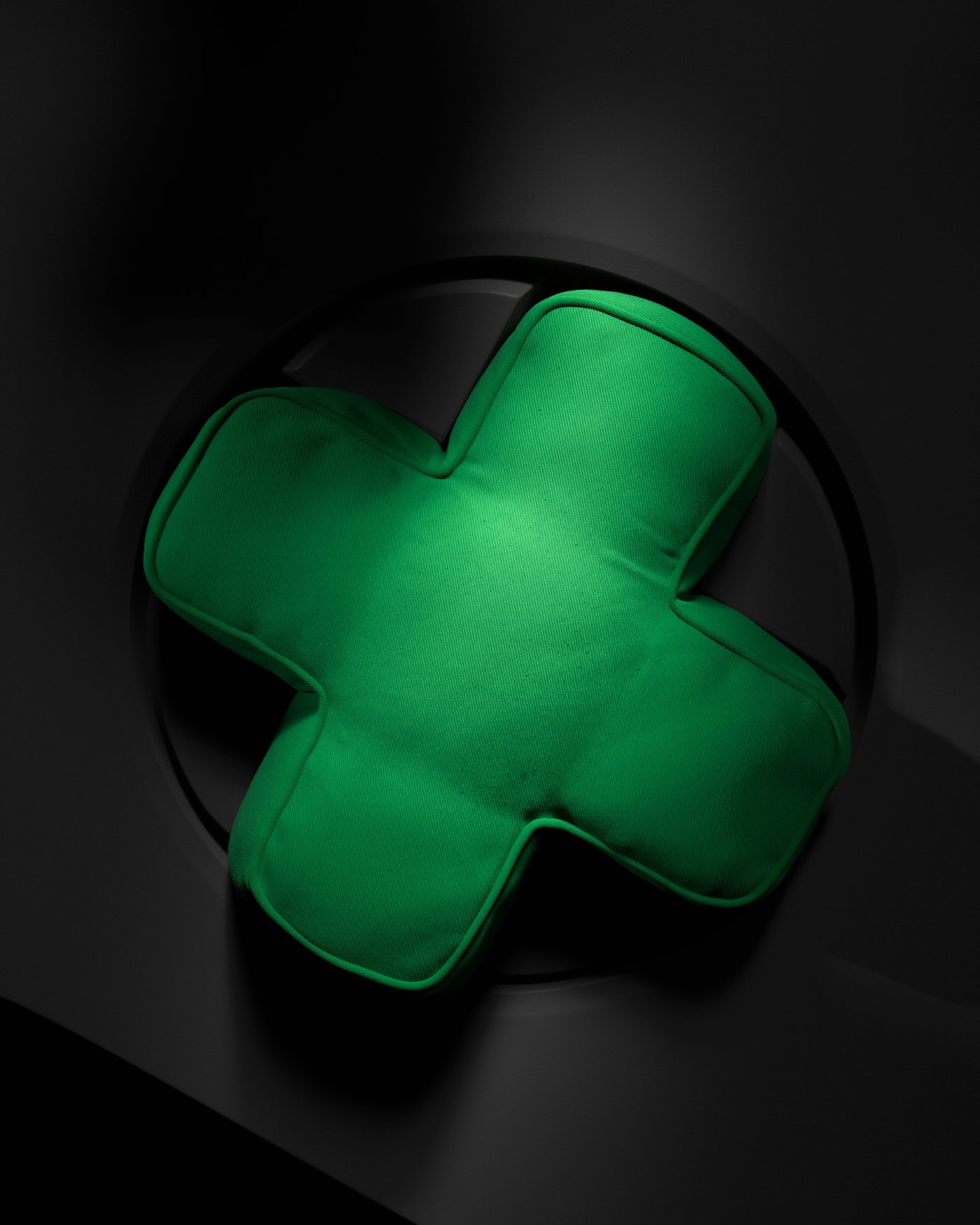 The YXSTABY cushion on a black background with dramatic dark lighting.