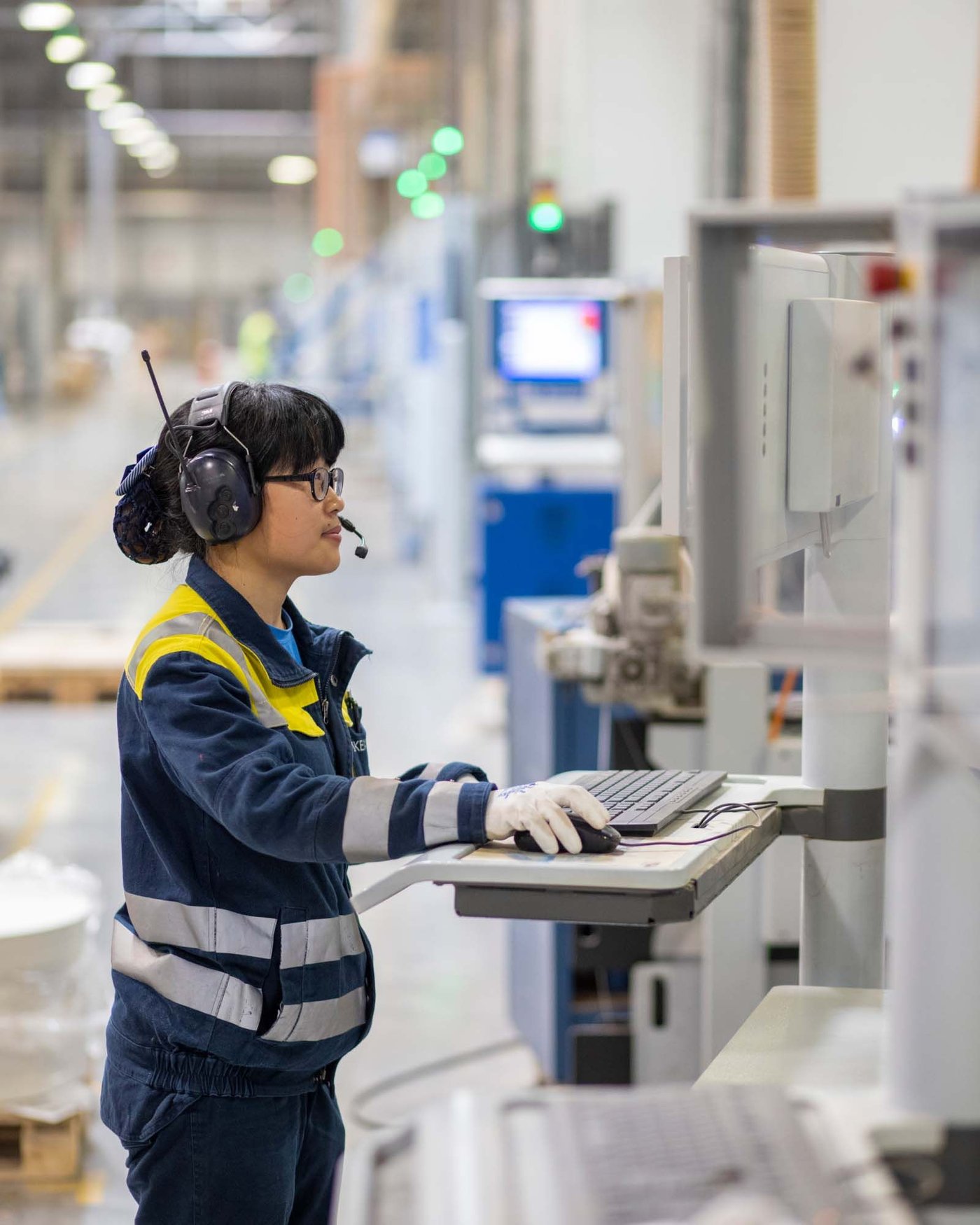 A person working in an IKEA Industry factory.