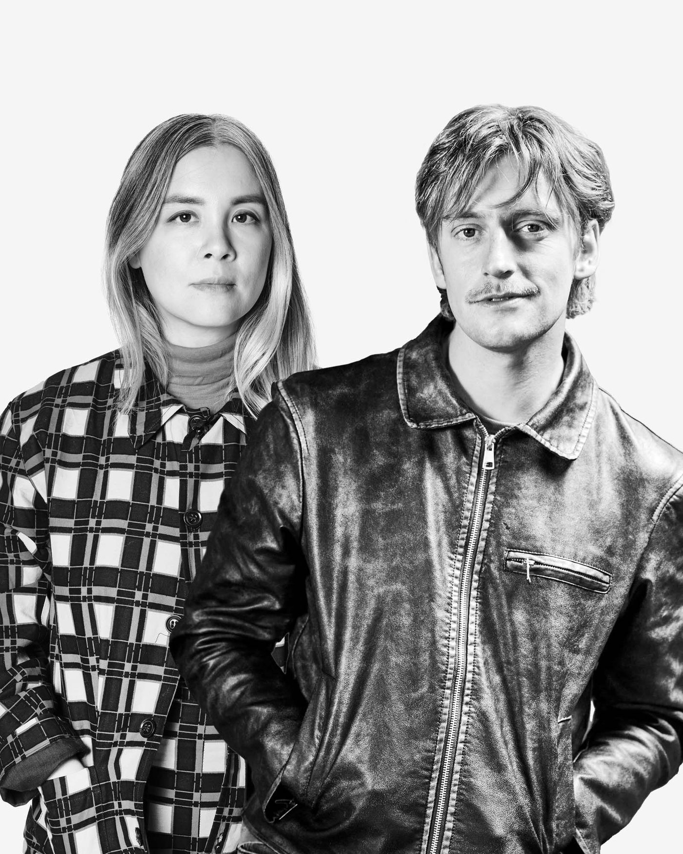 A black-and-white portrait of Evelina Kroon and Gustaf Westman looking at the camera.