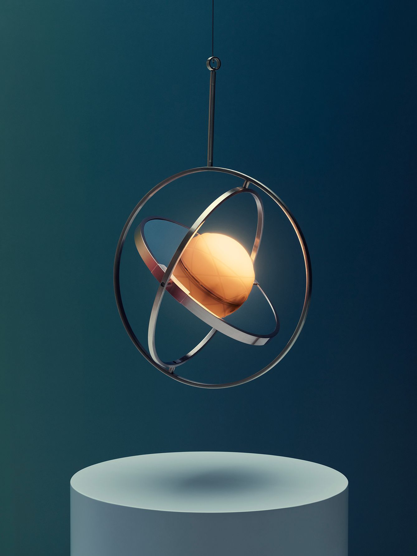 A dark room with a solar powered stainless lamp hanging from the roof.