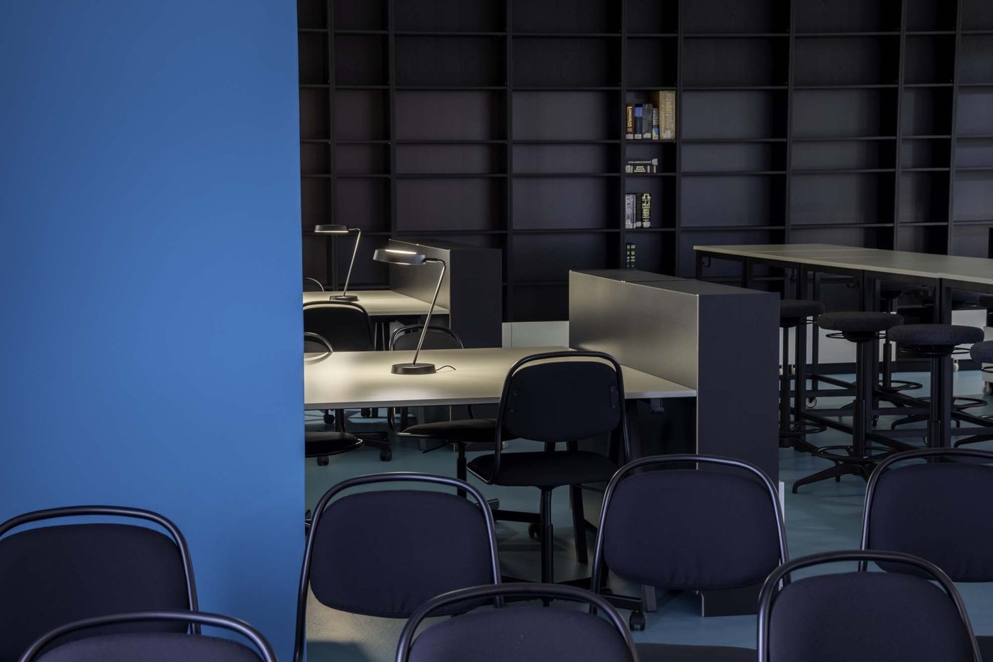Chairs, tables and shelves in the library at the International Burch University.