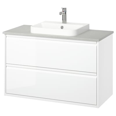 Moderni bijeli umivaonik s elegantnim dizajnom, poluudubljenim umivaonikom, minimalnim ručkama, može se montirati na zid.
