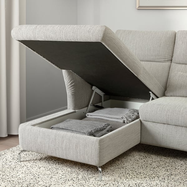 Moderna siva tkanina kauč sa spremištem. Podržava podesive naslone za glavu. Pruža skriveno spremište ispod sjedala.