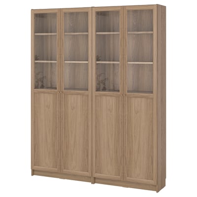 Nagy fa könyvespolc üvegajtókkal. Ikea BILLY világosbarna színben. Négy rész, kettő üveggel.