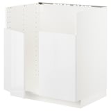 Fehér konyhaszekrény az ikeas METOD sorozatból, fényes ajtóval és masszív kerettel.