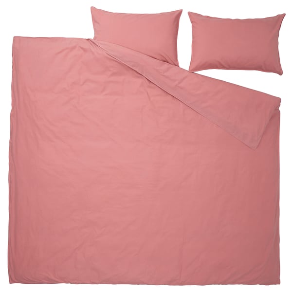 A pink ÄNGSLILJA duvet set in cotton with a simple, solid design and envelope closure pillows.