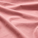 Close-up of soft pink duvet fabric, smooth & inviting.
