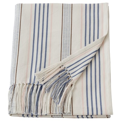 This image shows a beige and blue striped cotton throw blanket with fringe, ethically made with handwoven and knotted details.