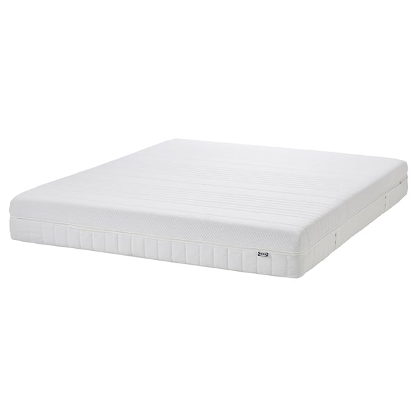White IKEA anneland hybrid mattress, rectangular, multi-layer foam and pocket springs, firm comfort.