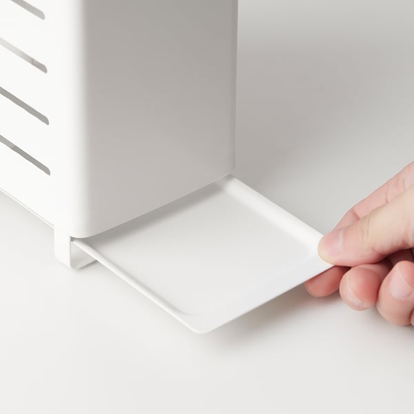 Hand holding knife block