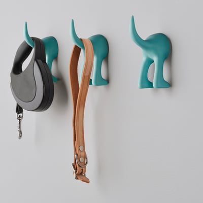 Three teal dog hooks: leash, belt, empty.