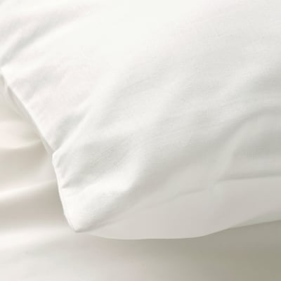 BALSAMPOPPEL: white organic cotton pillow, soft, breathable, gots certified. Rectangular shape with smooth, simple design.