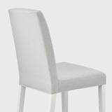 Modern grey fabric dining chair with wooden frame.