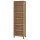 An upright BESTÅ light brown bookshelf with five shelves, crafted from wood.