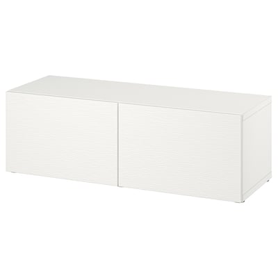 A white ikea BESTÅ unit with a simple design, rectangular shape, and wooden construction.