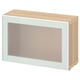 The BESTÅ is a white and light wood rectangular cabinet with frosted glass door.