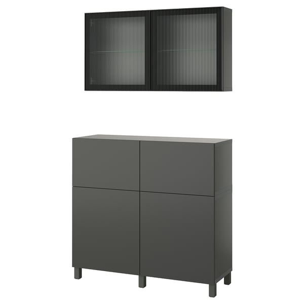 Dark grey BESTÅ cabinet with 4 drawers and a wall-mounted shelf featuring a ribbed glass door.