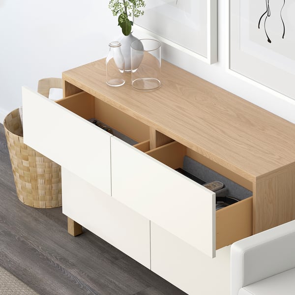 Modern console table, open drawers, light wood top, clean design.