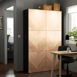 Wooden BESTÅ cabinet in home office with baskets.