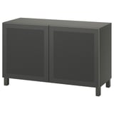A dark grey ikea BESTÅ storage cabinet with two doors and adjustable shelves.