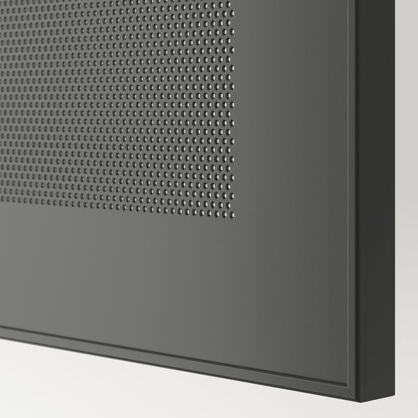 Modern storage unit with perforated metal panel, sleek design, quality materials. Soft closing hinge detail.