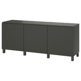 A black BESTÅ storage unit with three closed doors, rectangular shape, and modern minimalist design.