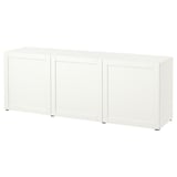A white BESTÅ sideboard with three doors, offering storage space.