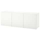A white BESTÅ sideboard, featuring three cabinets with a minimalist design, ideal for storing and displaying items.