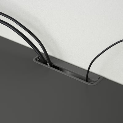 Black tv bench with cable management. Cables neatly pass through slots at the back.
